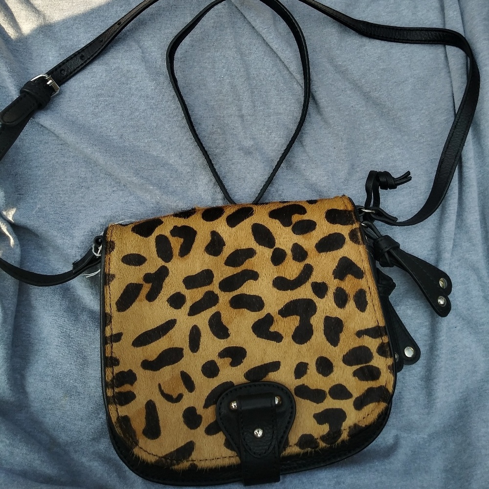 Three shoulder purses,and two small purses
